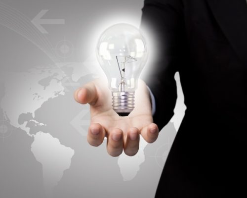 businessman-with-light-bulb-map-background_1232-161